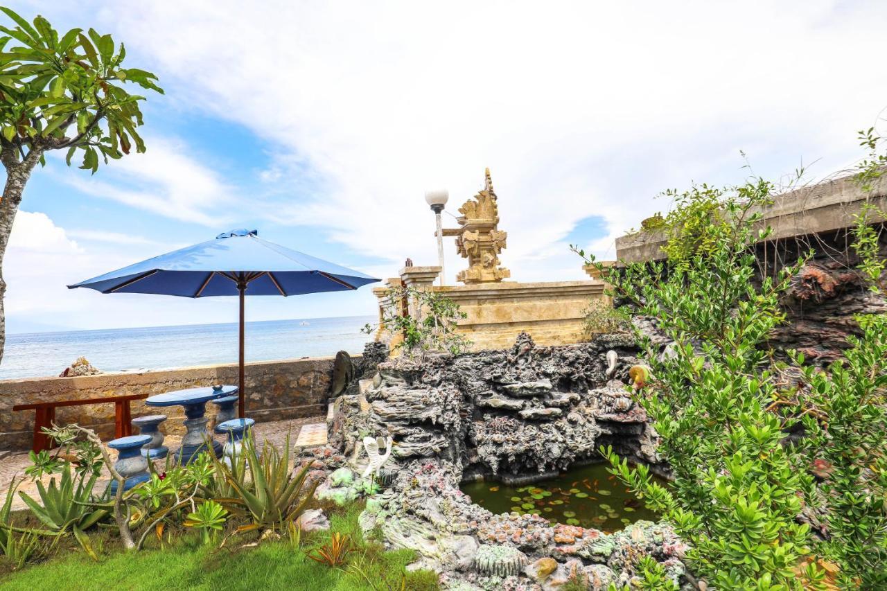 Swan Beach Inn Batununggul Buitenkant foto
