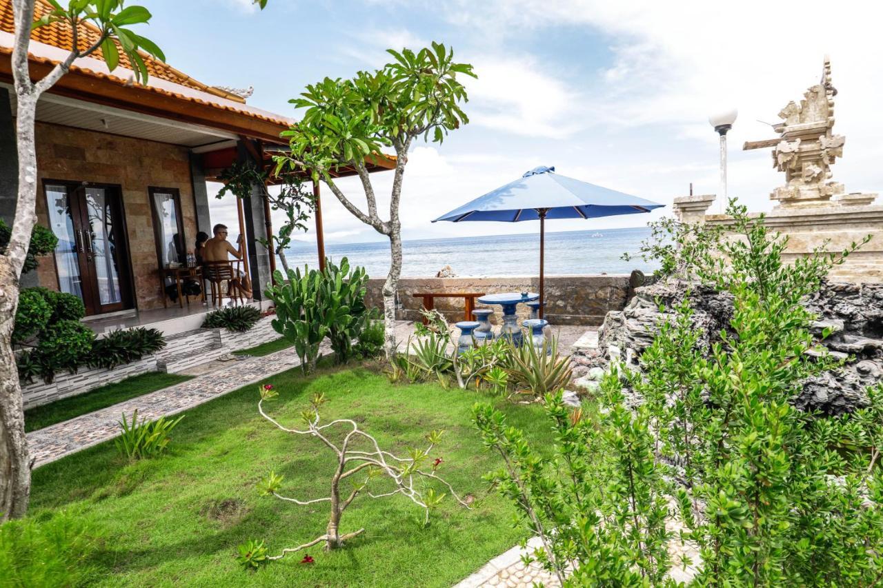 Swan Beach Inn Batununggul Buitenkant foto